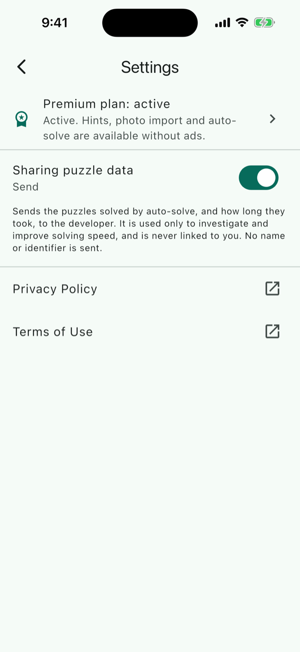 Settings screen: premium plan status and the Sharing puzzle data switch